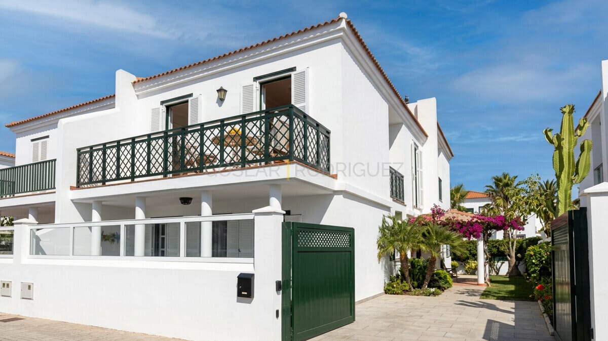 Exterior view of white villa in Abades, Tenerife with balcony.